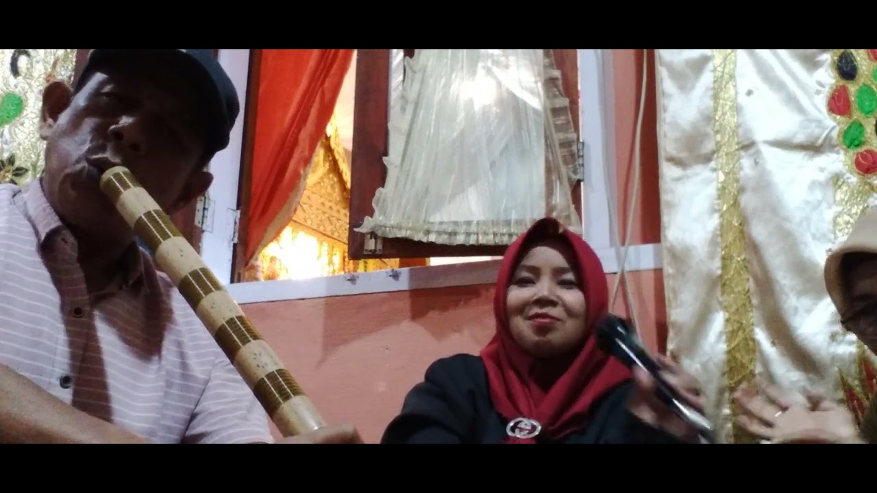Singgalang gubalo itiak. bagurau di koto tuo panyalayan.