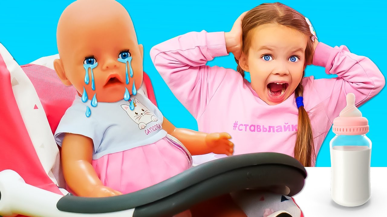 Maya pretends to play cooking toy food for the baby doll. Kids in a toy kitchen. Family videos.