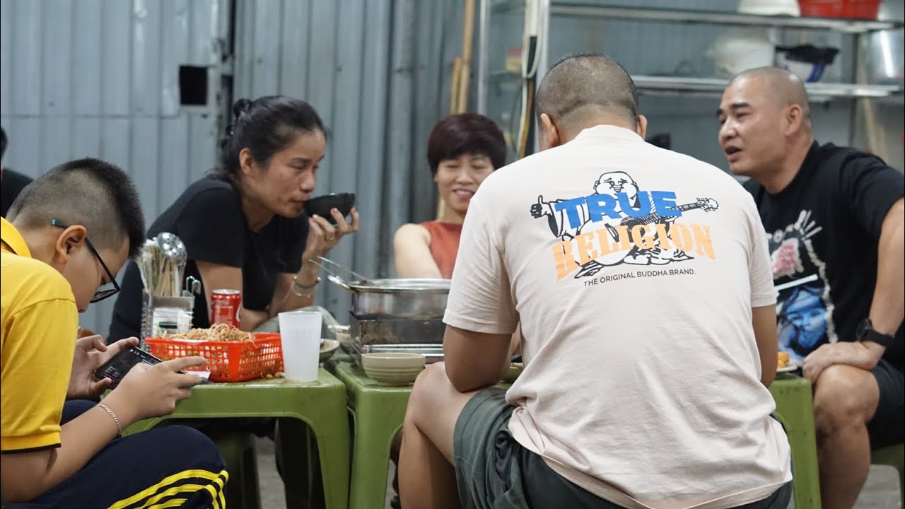 Black American Eating Vietnamese Hot Pot with local Vietnamese friends 