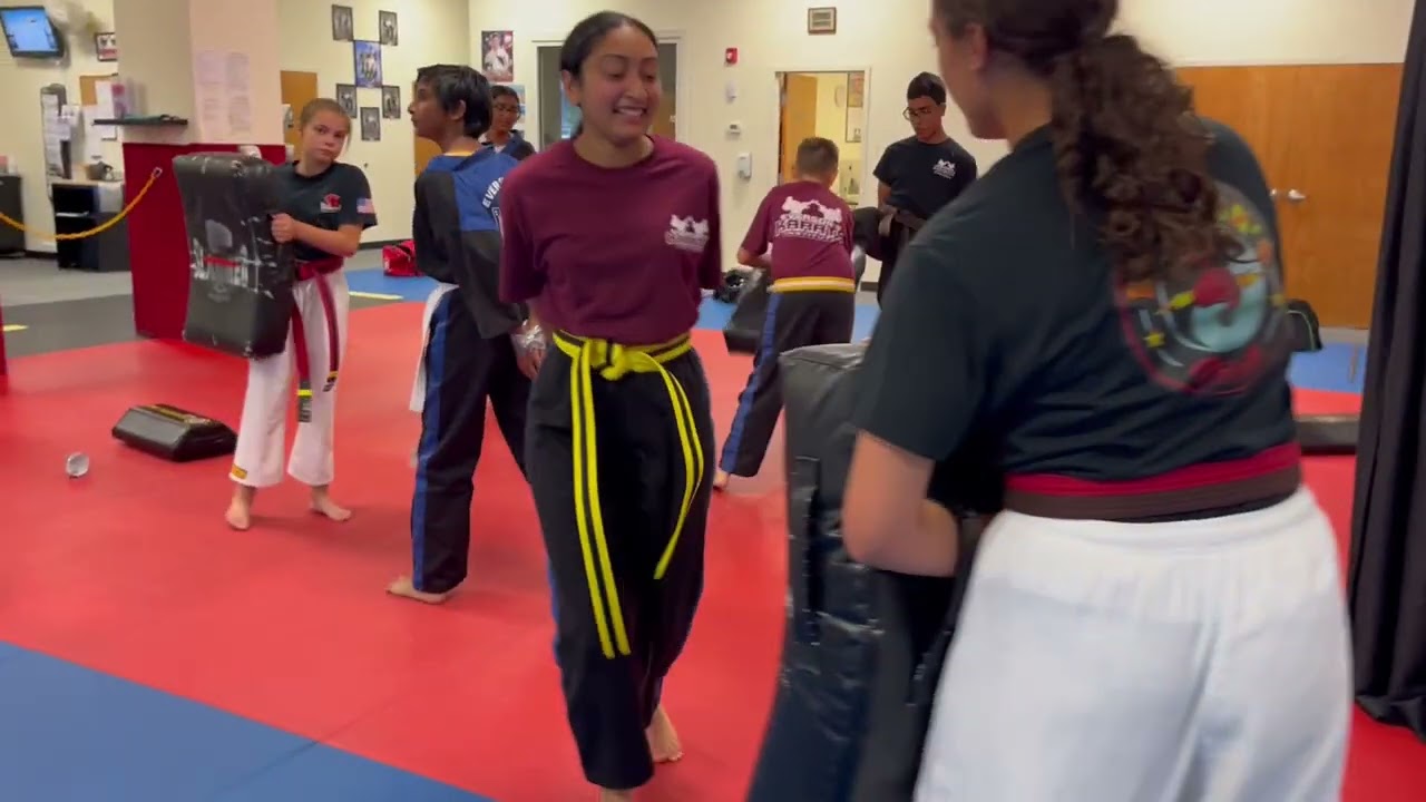 Everson's Karate Institute teens learning how to escape from being duck taped.