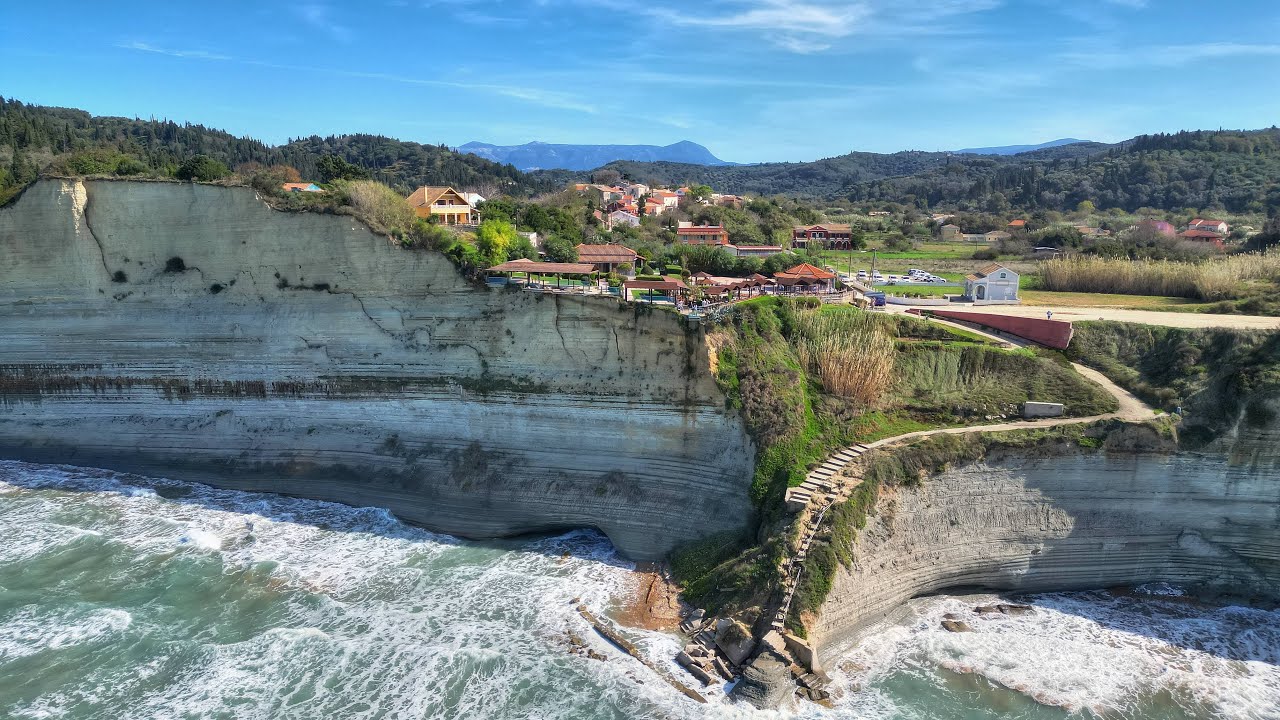 Corfu, Greece 4K Drone - Logas Beach - Peroulades - Glass Skywalk - 7th Heaven Cafe