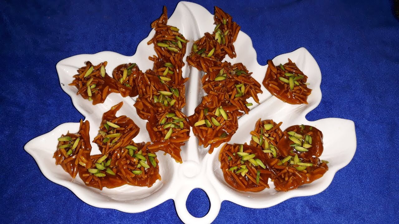 آموزش سوهان عسلی بادام وزعفران مناسب ایام عیدبسیار  تردوخوشمزه ازمامان تی وی (پروانه جوادی)
