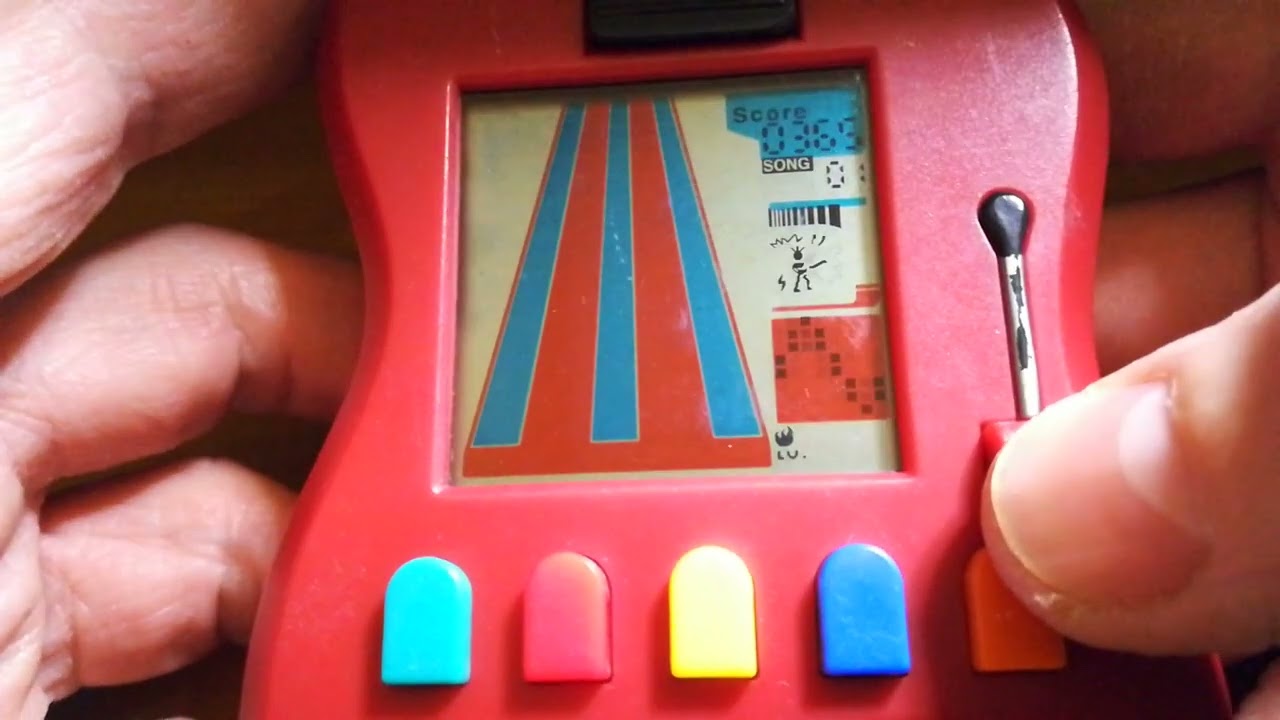 Activision Guitar Hero - LCD handheld game