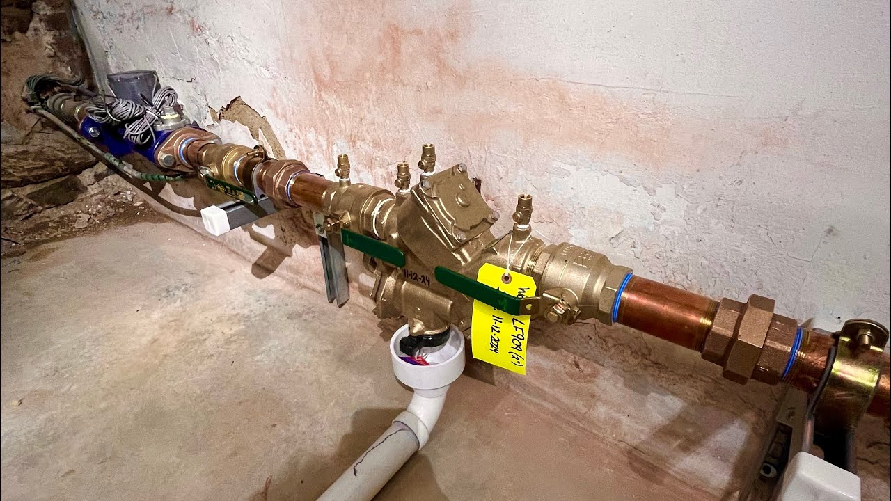 Plumbers Install Commercial RPZ and Compound Meter!