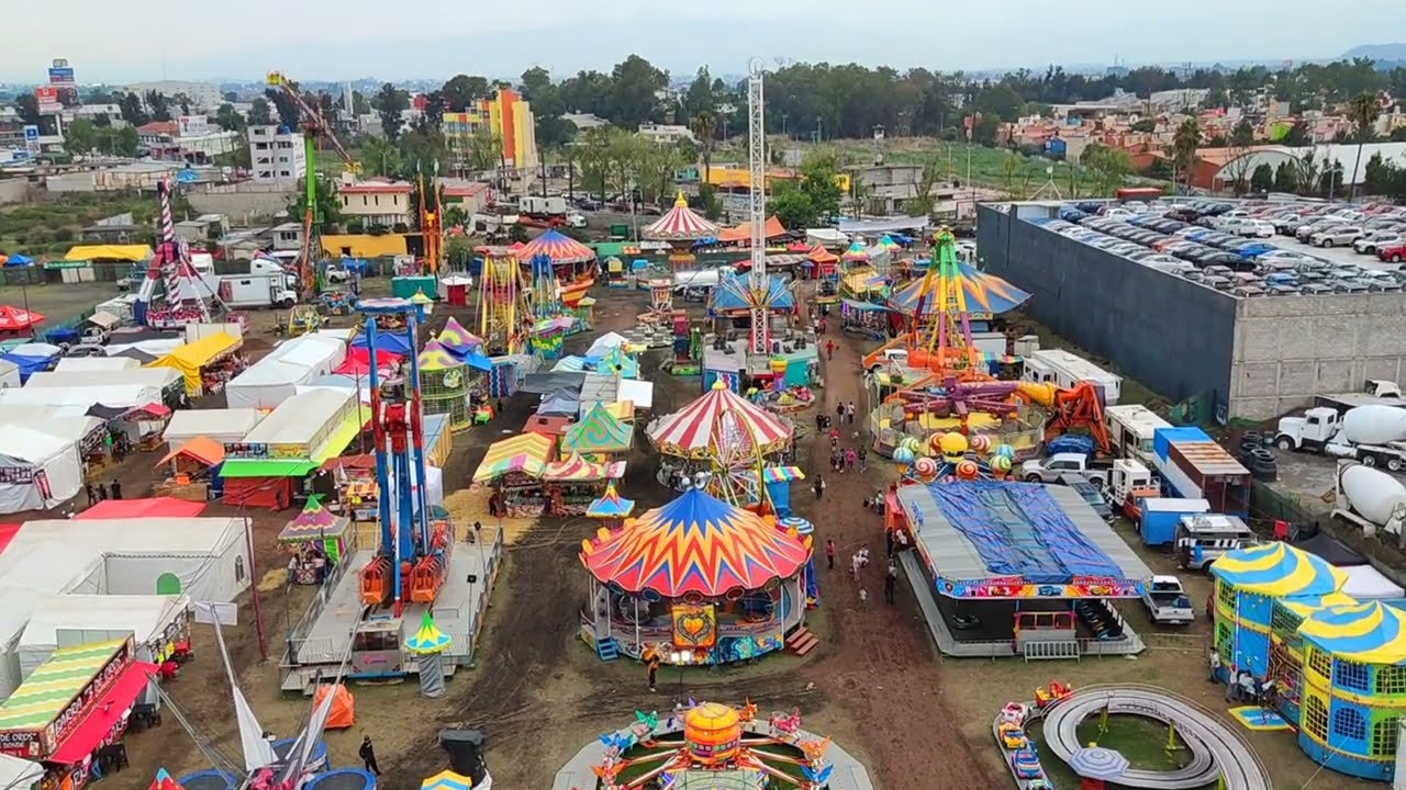 En la feria nacional IXTAPALUCA (FENAIX 2025) Juegos mecánicos y panorámica desde la Rueda gigante.