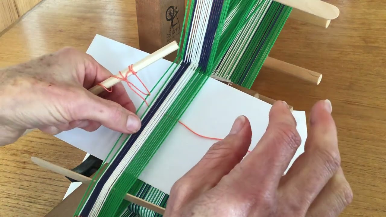 Making string heddles on the inkle loom.