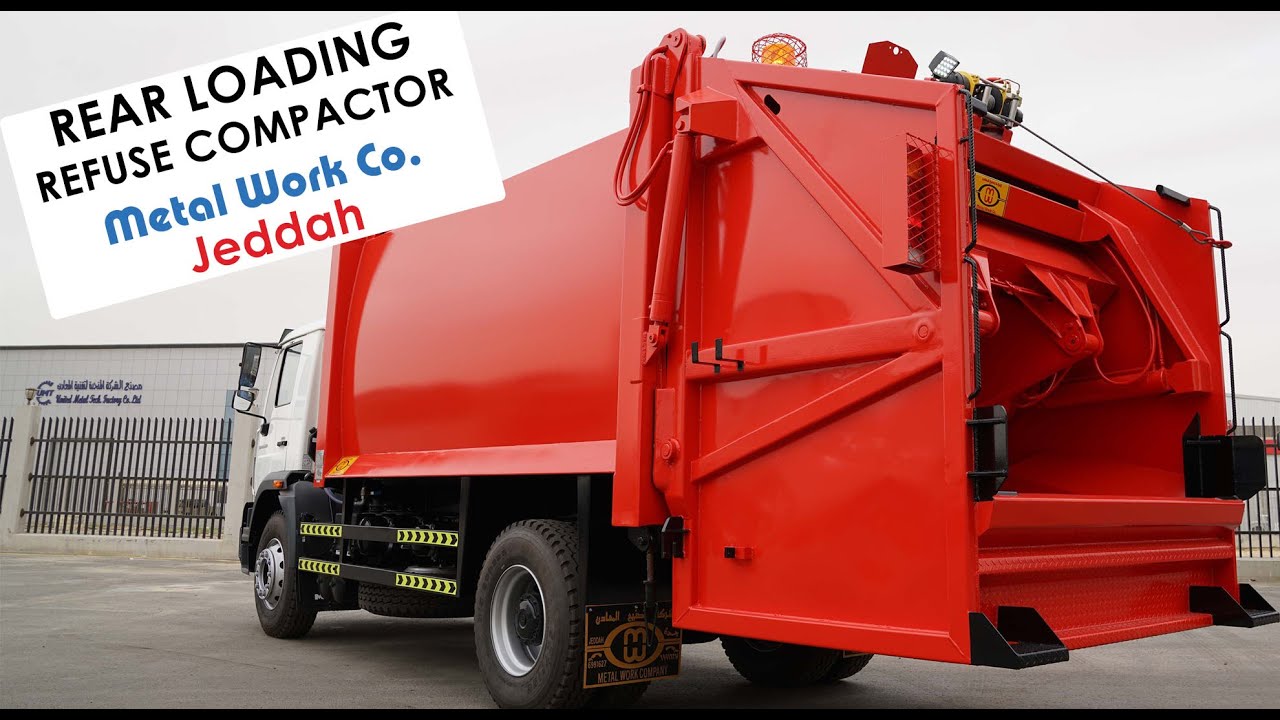 REAR LOADING REFUSE COMPACTOR 22 CUBIC YARD WITH 2 CUBIC YARD CONTAINER