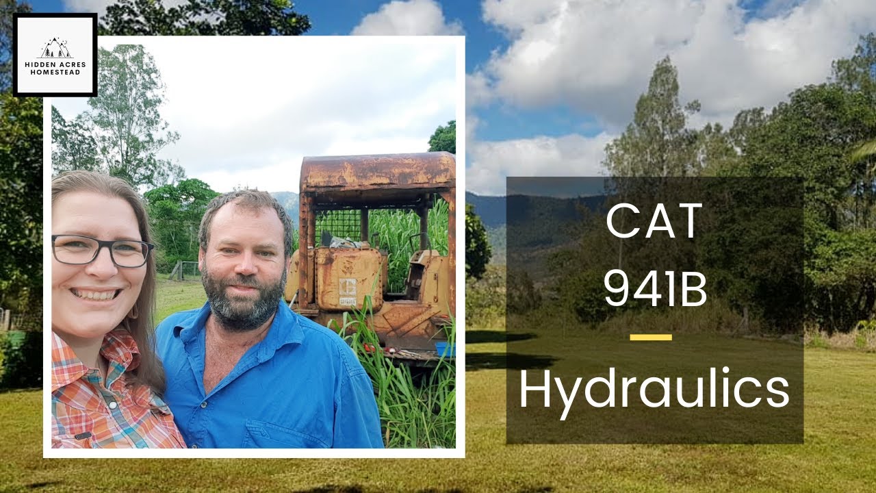 How to replace a site glass in a hydraulic tank of CAT 941B Crawler Loader