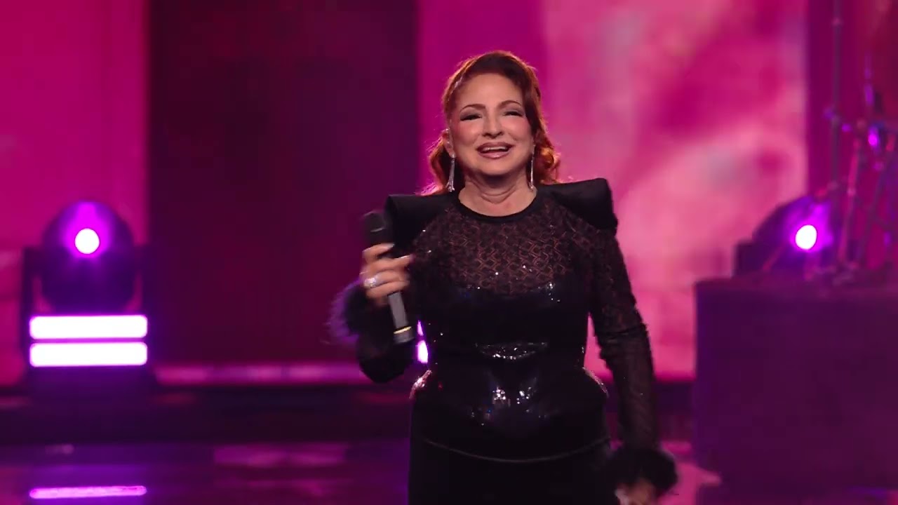 Gloria Estefan - “Rhythm Is Gonna Get You,” 