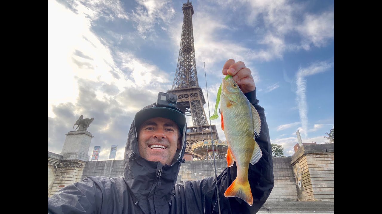 Fishing The Seine River In Downtown Paris, France