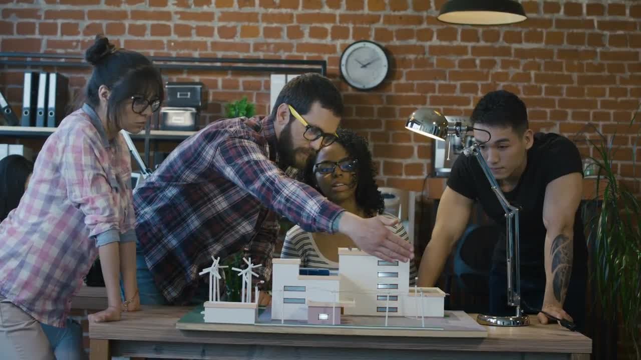 Young Architects Discussing Solar Project Stock Video