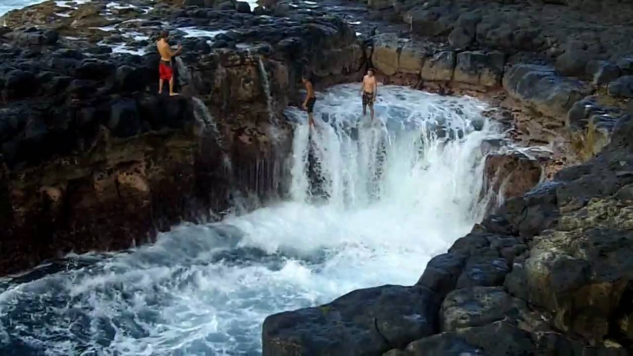 Queen's Bath - Kauai, HI.  Crazy kids 