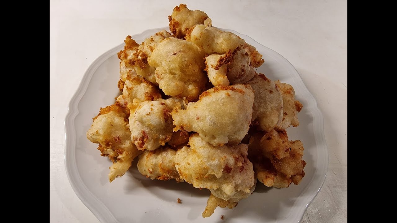 Zeppole di pasta cresciuta con salame e provola, facili, veloci ed economiche.