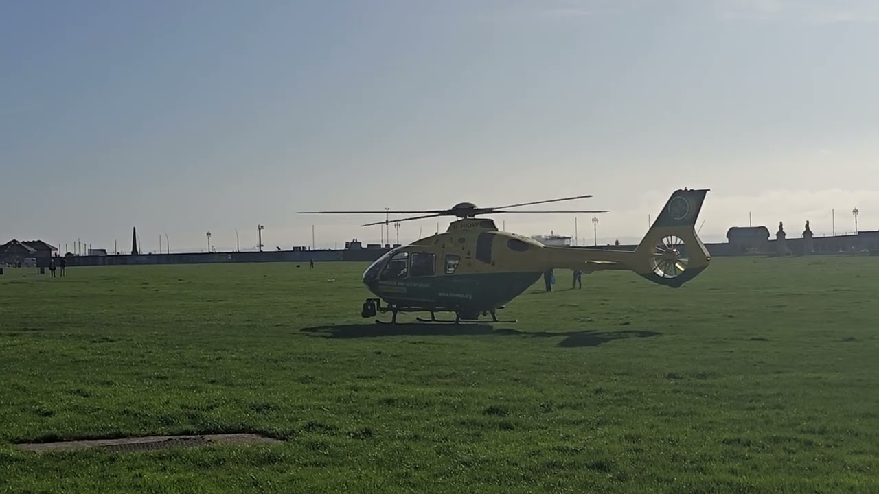 Hampshire and Isle of Wight air ambulance taking off from Southsea common