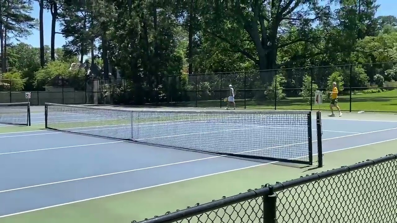 St. Christopher's tennis No. 5 Cade Collingwood, Collegiate No. 5 Brayden Bogese rally during VISAA