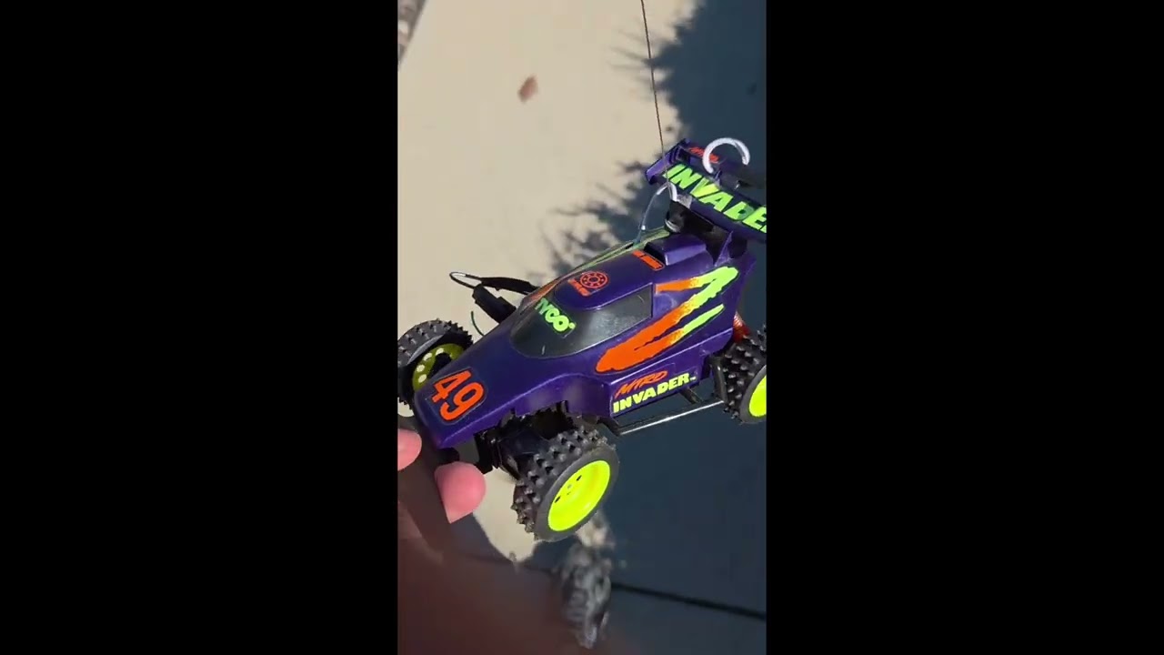 Tyco RC Invader driving on the road