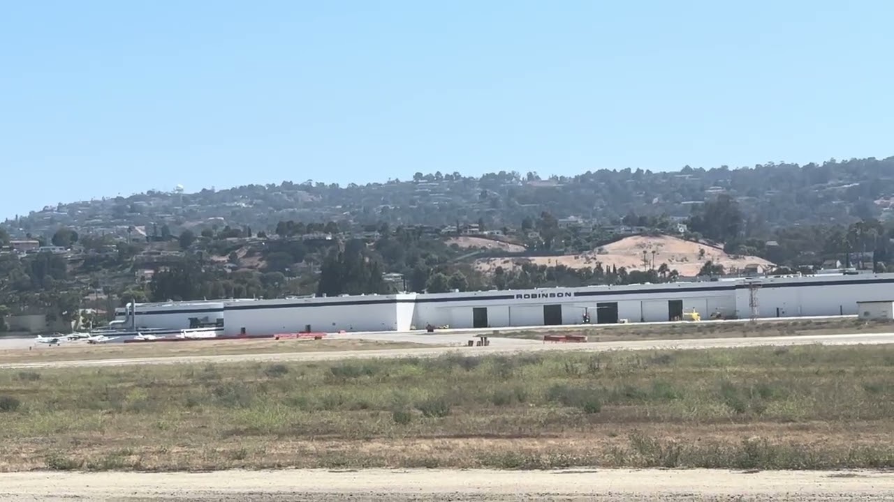 Robinson R44 Helicopter N7166C taking off from Torrance Airport 