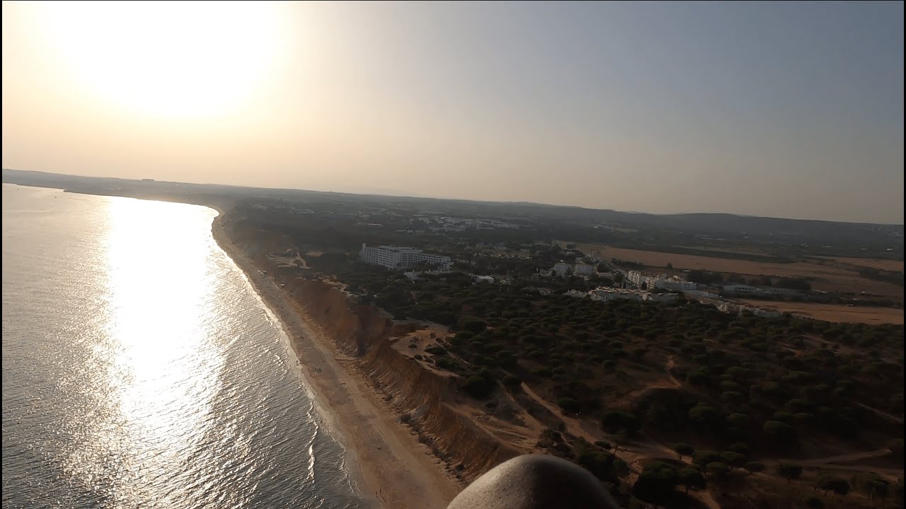Algarve from the skies 4K: Paragliding over Albuferia, calm, soothing, and relaxing.