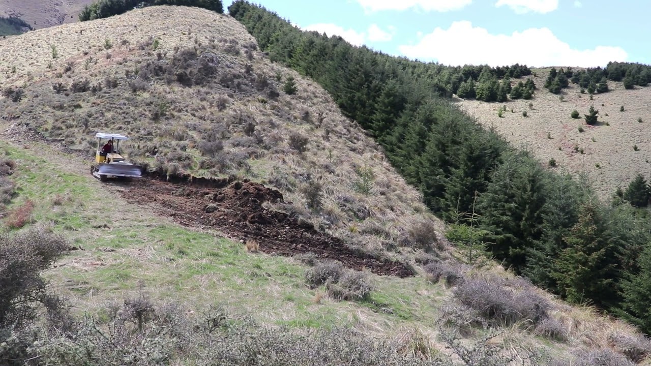 Dozing a Cabin Site on a Hill with a Komatsu D21A