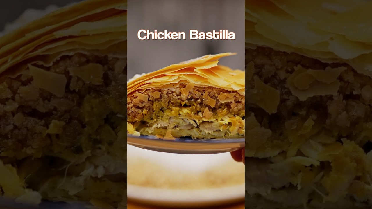 Moroccan Chicken Bastilla 🇲🇦 &ndash; Flaky pastry, spiced chicken, and a surprise sweet topping!