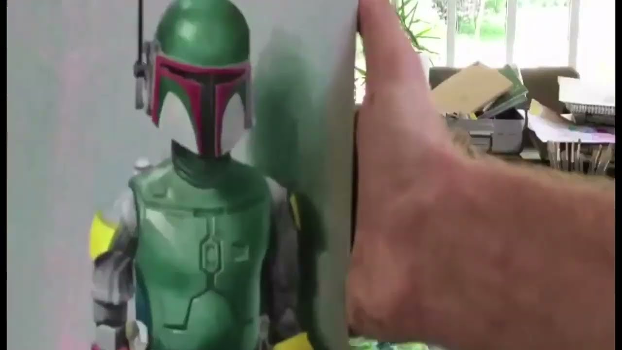 Stuart Pearson Wright paints a Boba Fett toy