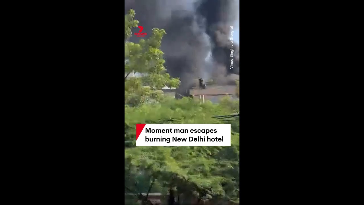 Moment man escapes burning New Delhi hotel