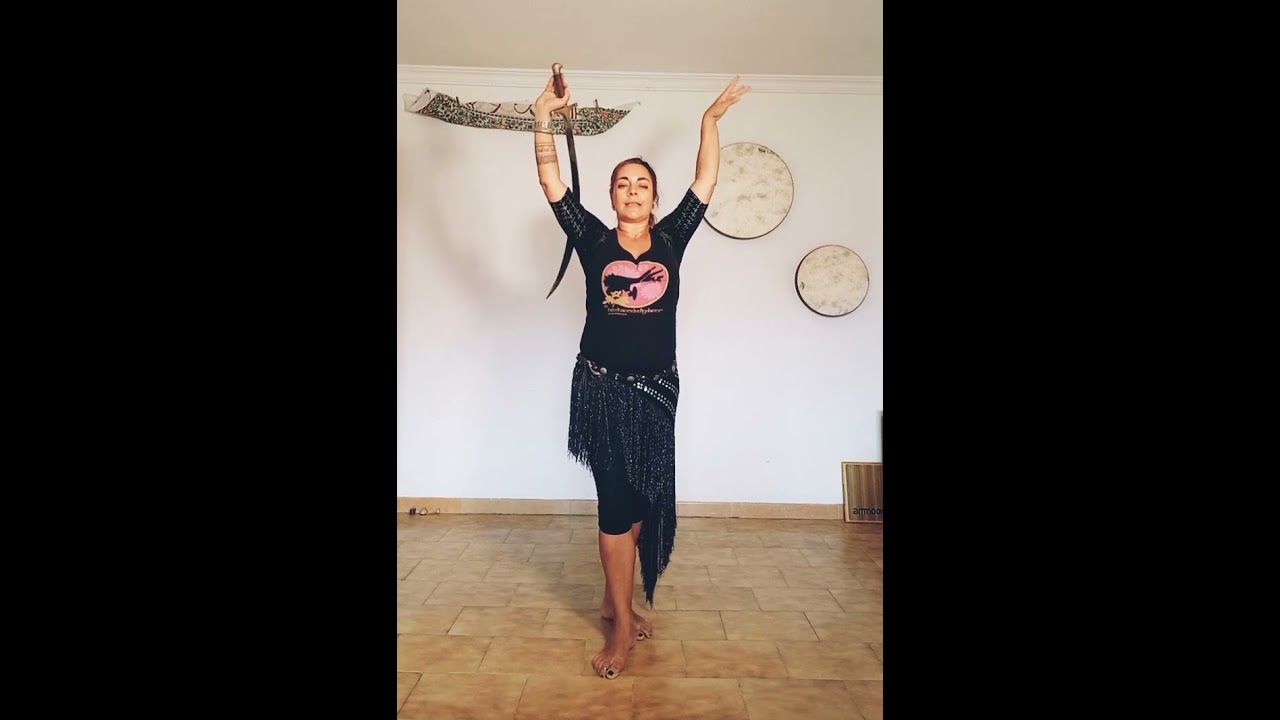 'Arm position' and basic 'circle and release' transition for FCBD® style Sword dancers.