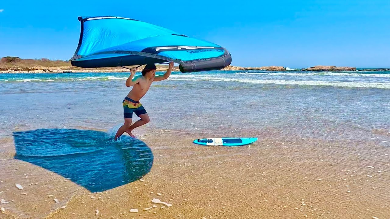 Skimboarding with a wing