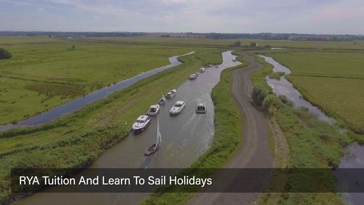Hunter's Yard, Ludham, Norfolk, UK drone film film. 1930's traditional boat yard and sailing fleet