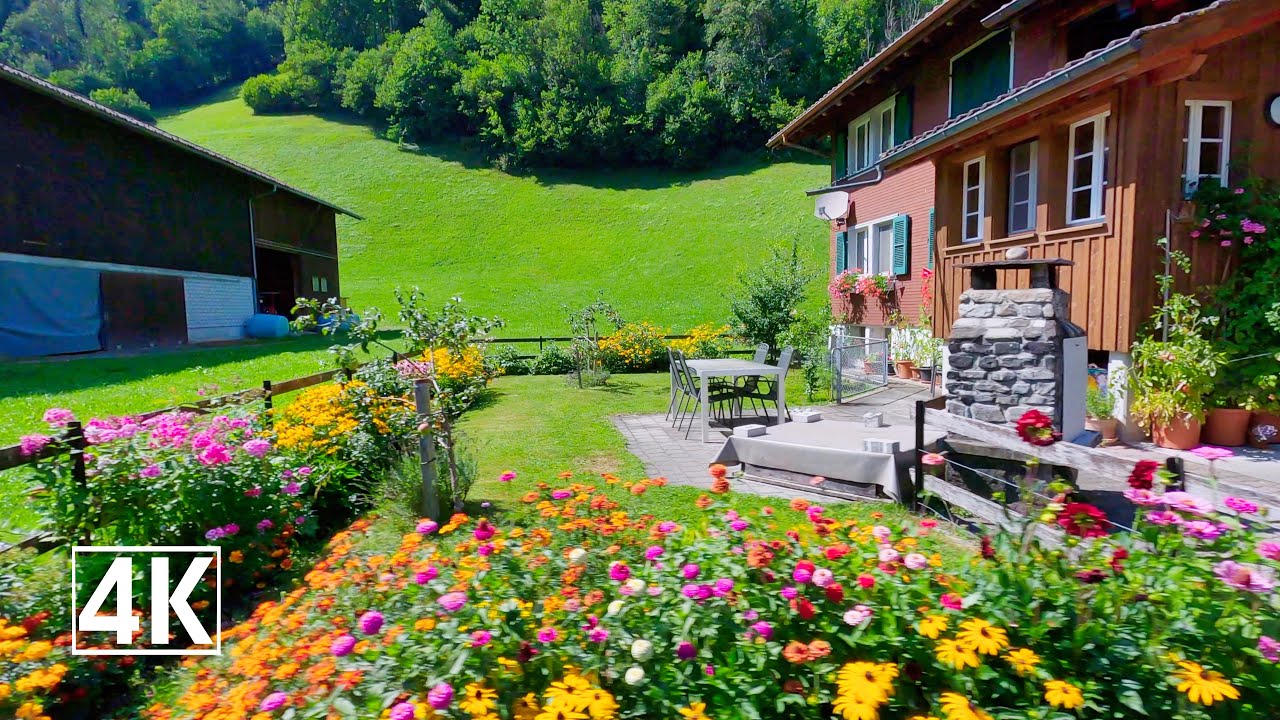 Lungern Switzerland 🇨🇭 the emerald green lake and the mountain village of Lungern