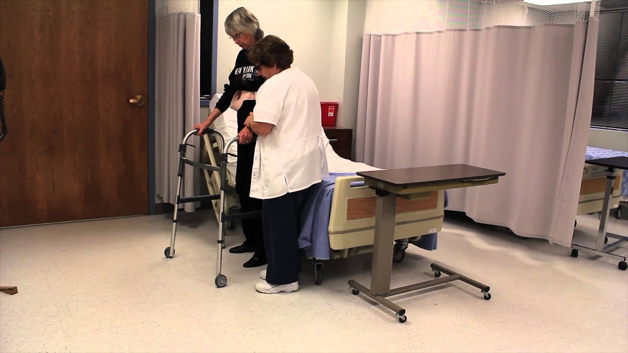 Assisting with ambulation for a resident using a walker