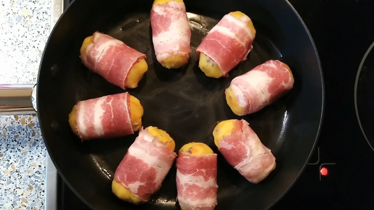 Katroffelr&ouml;llchen mit K&auml;se ummantelt mit Speck, Kartofellp&uuml;ree einfach mal anders, schmeckt super.