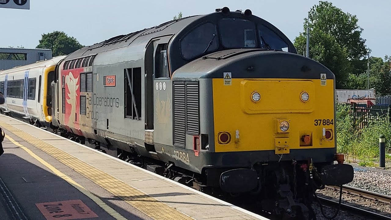 Rail Operations Group 37884 and 466033 passing Peterborough. 