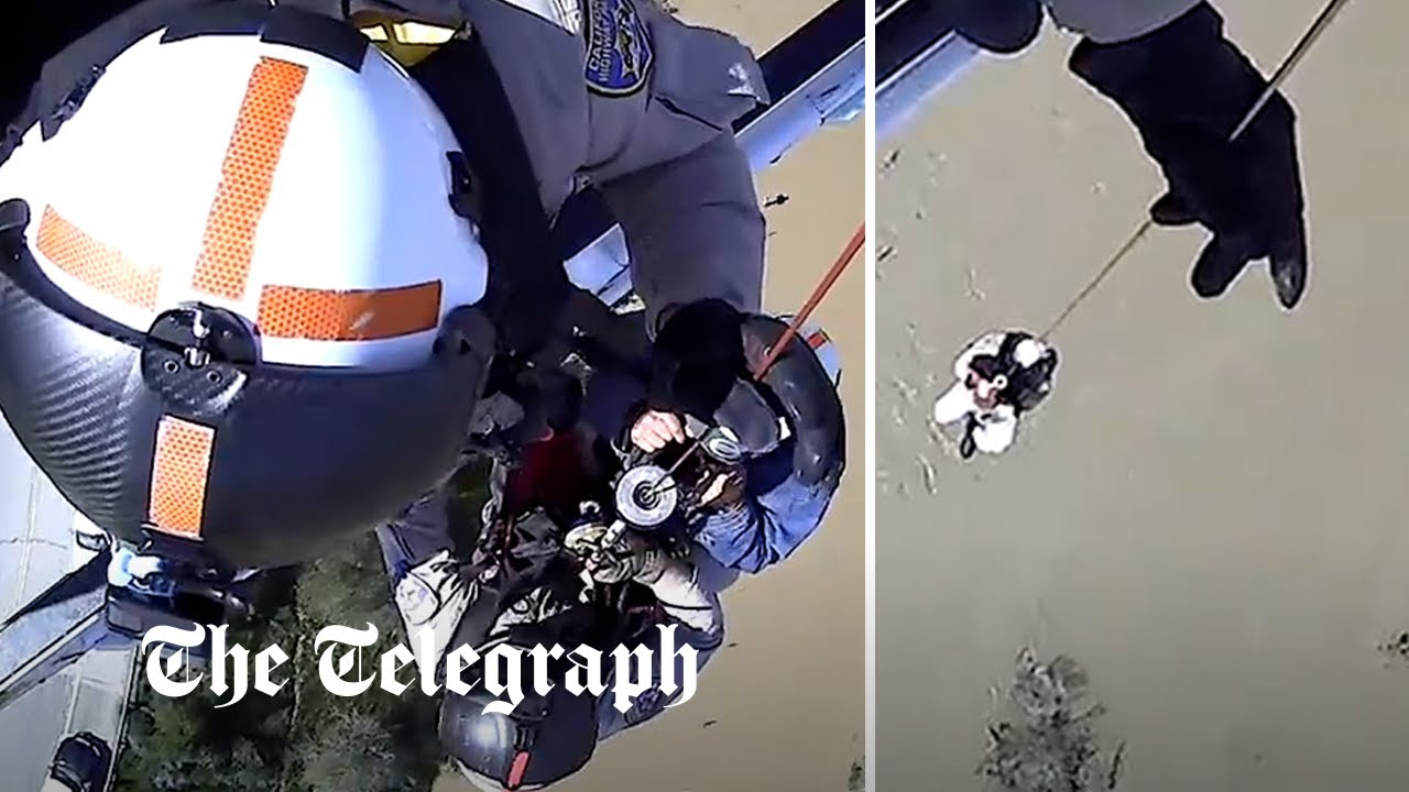 California flood: man stranded after his car is swept away