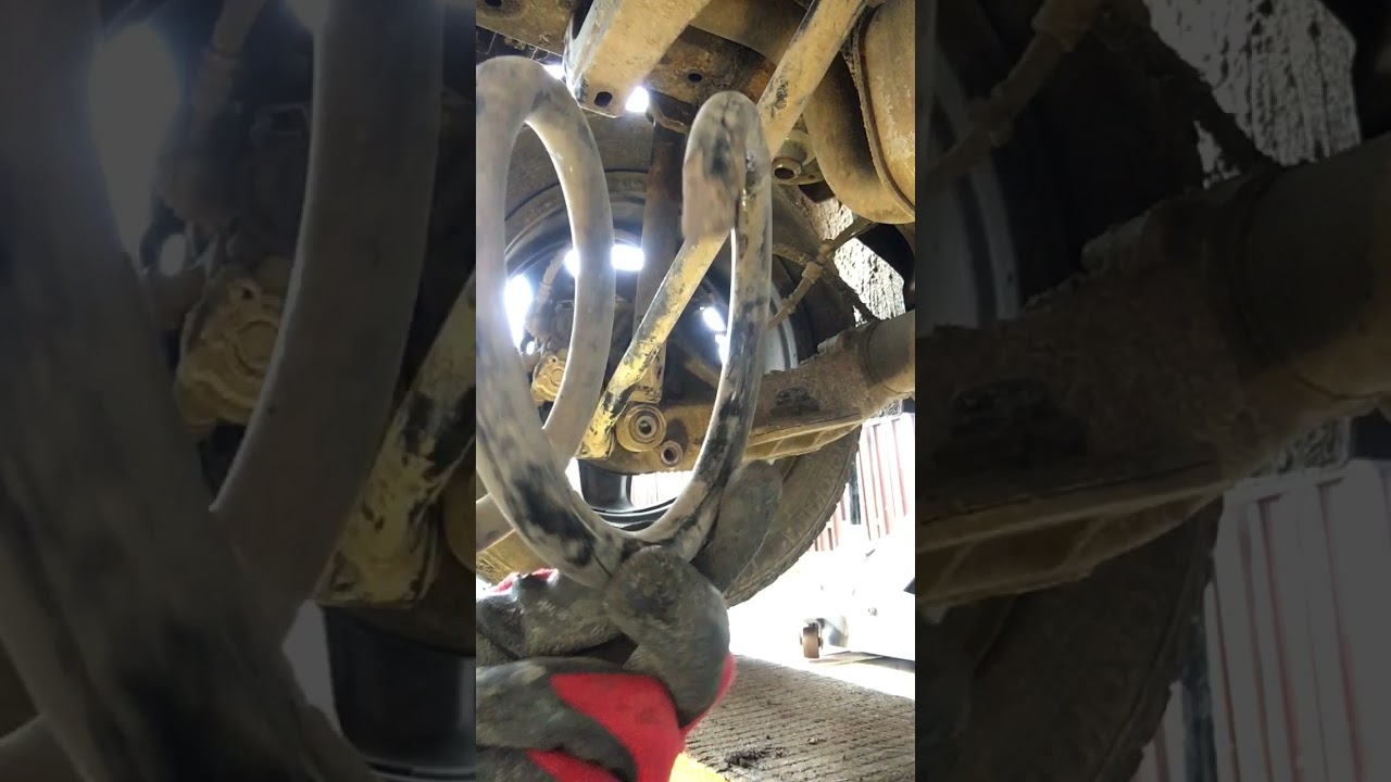 Замена пружины задней подвески Opel Astra J