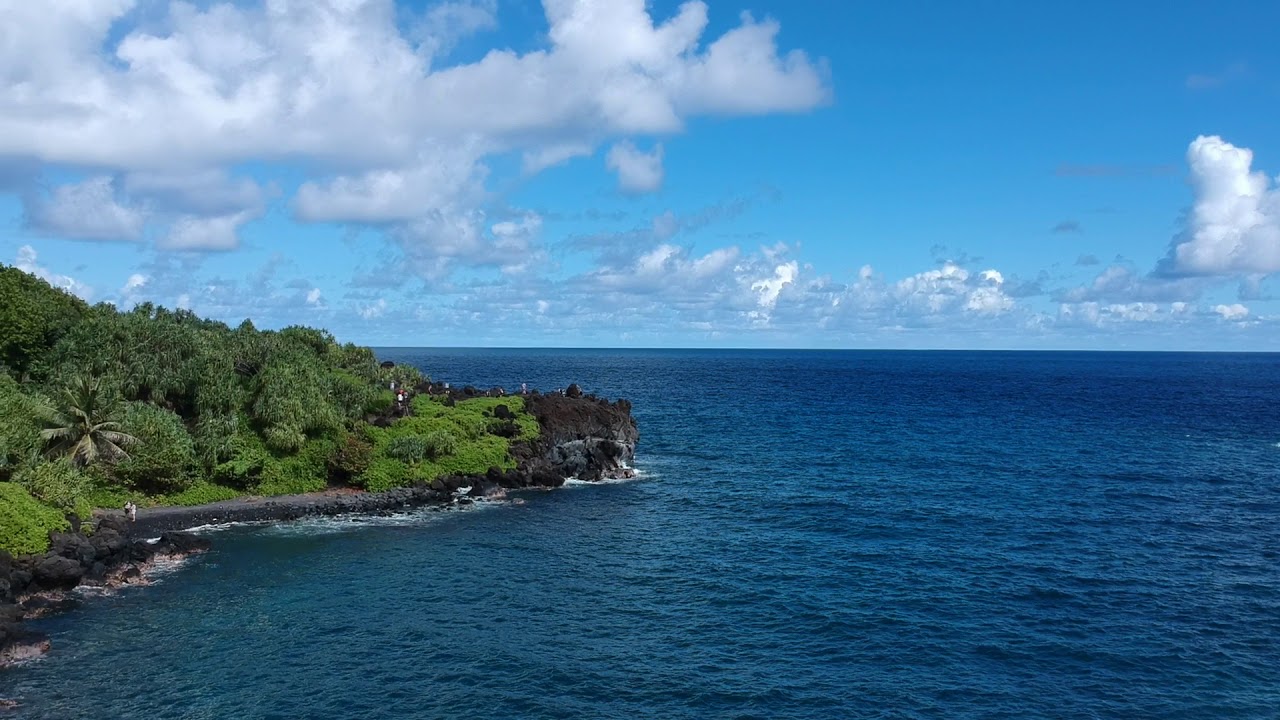 Raw Footage - Drone Flying in Black Sand Beach