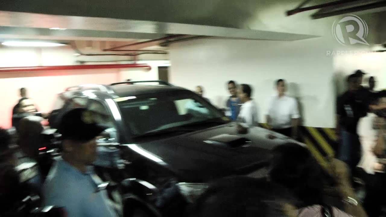 Junjun Binay leaves Makati City Hall with Senate sgt -at-arms