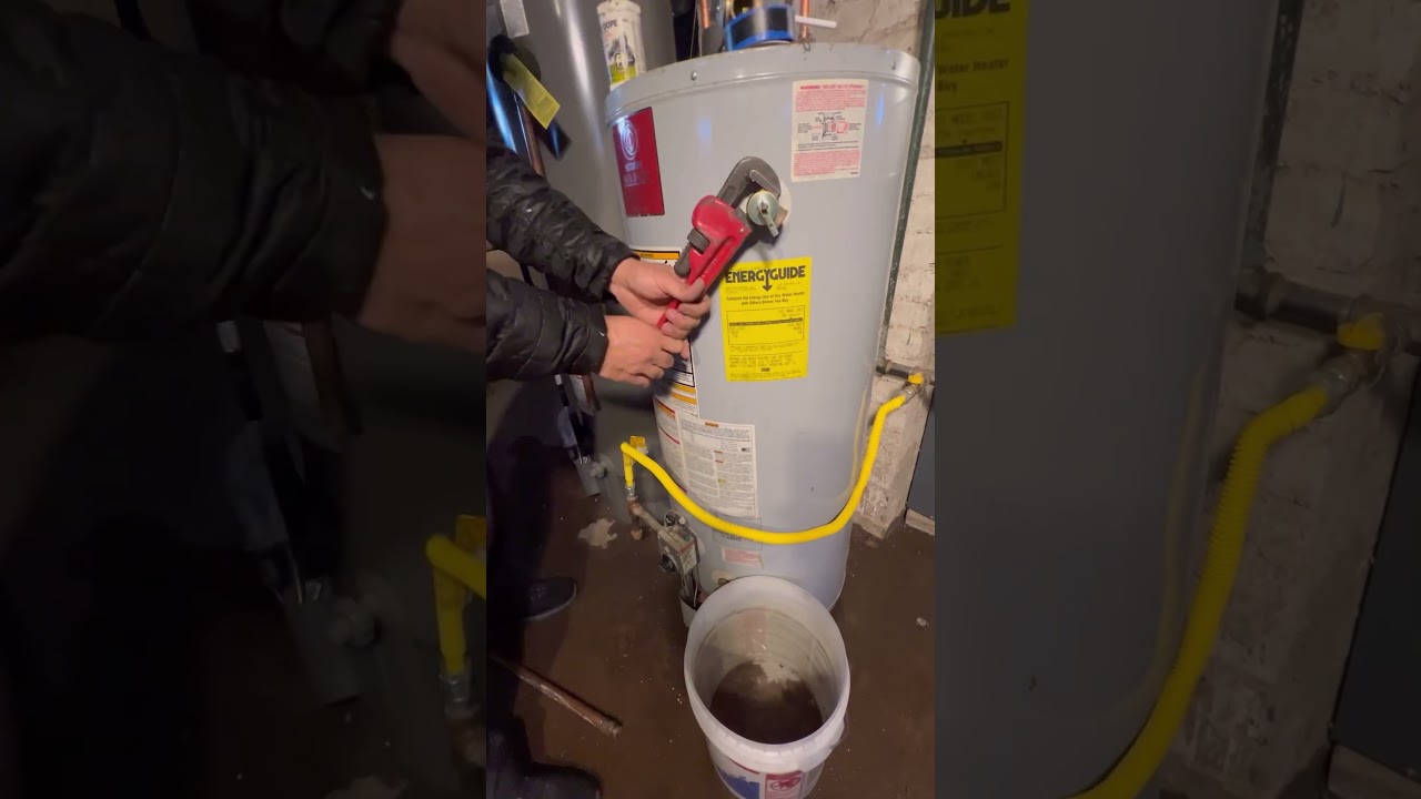 Fixing a leaky pressure relief valve on a gas water heater. 