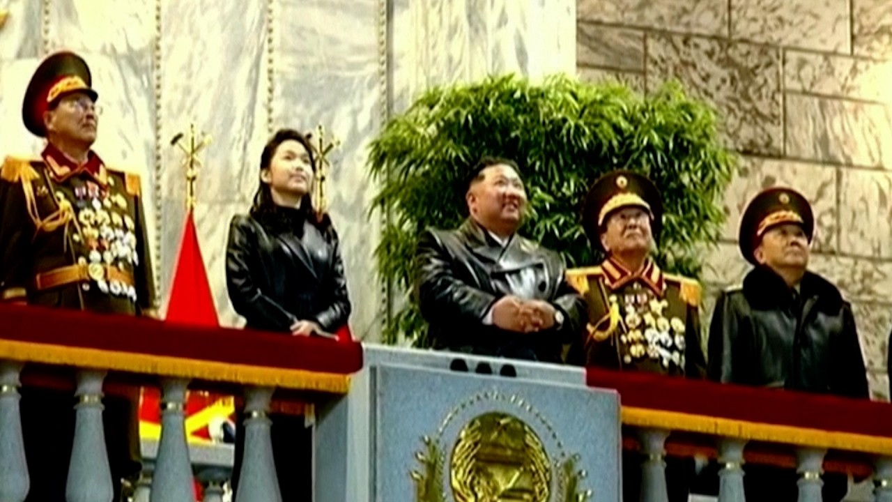 Kim and daughter in matching coats for huge military parade to mark ruling party congress