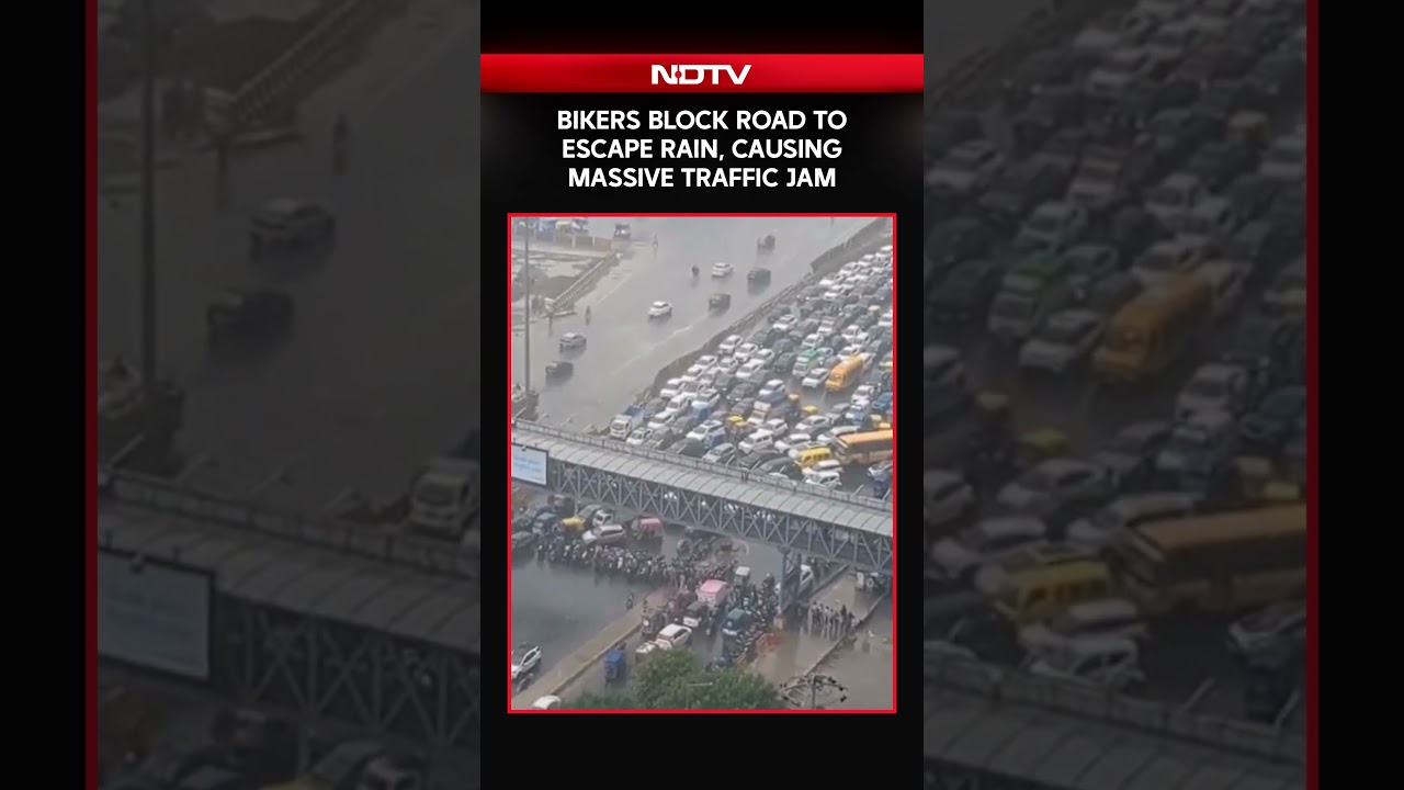 Bikers Block Road To Escape Rain, Causing Massive Traffic Jam