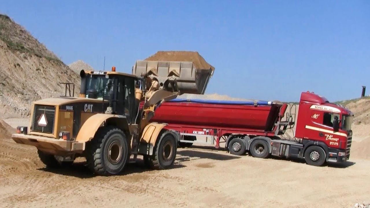 Loading Scania Trucks With The Cat 966 Wheelloader