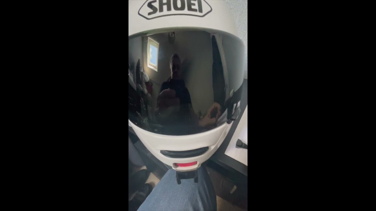 Dji action camera and dji mic setup for a shoei modular motorcycle helmet