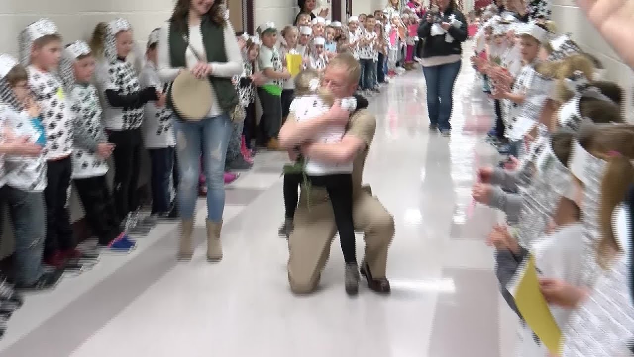 Sailor surprises daughter at school after 10 months apart