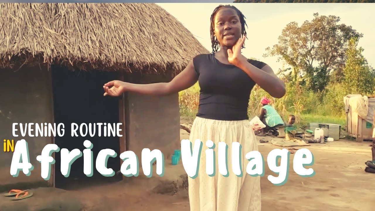 Rural village life in Africa. Evening routine of a African village girl before sunset.