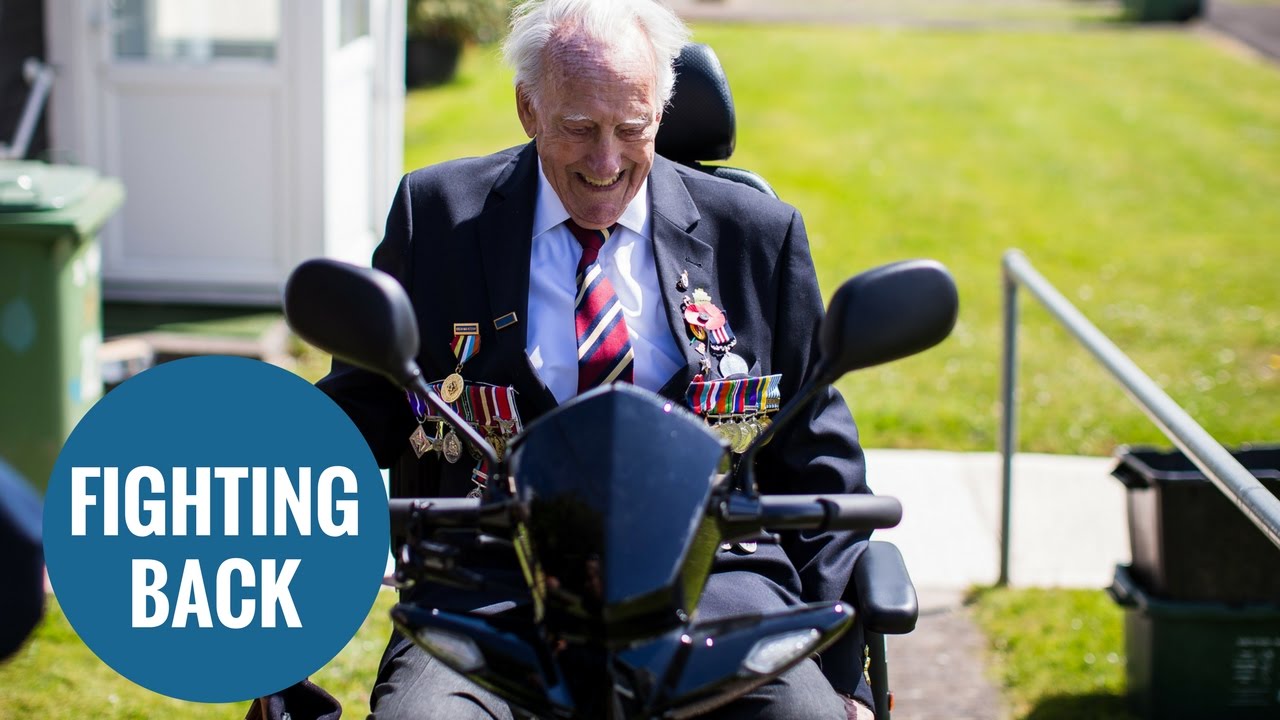 D-Day veteran aged 92 is given a mobility scooter by the British Legion