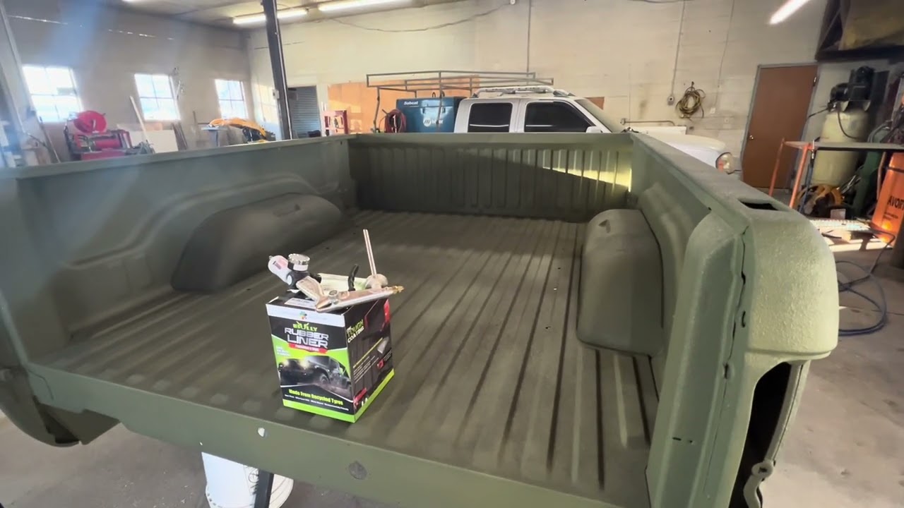 Finishing up the bed liner paint job on the 1996 Dodge Ram 1500. Bullyliner