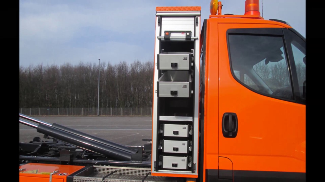 Iveco Daily mit Gotzen-Abrollkipper-System und Kran-Pritsche