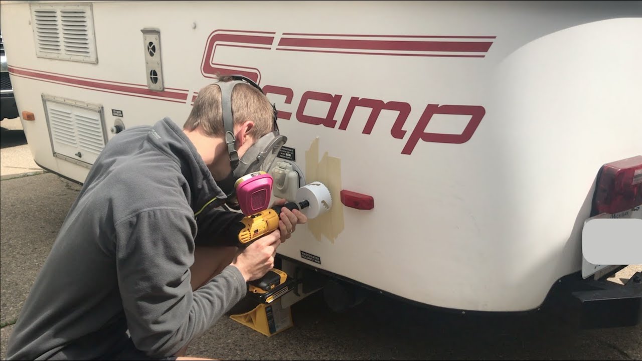 Ep 8: 13ft Scamp trailer modification; adding a cord port for solar & cellular cables