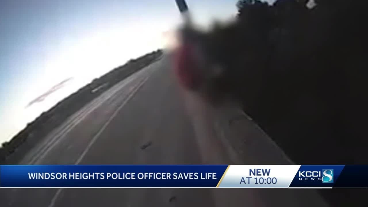 Video shows Iowa officer saving woman from jumping from bridge