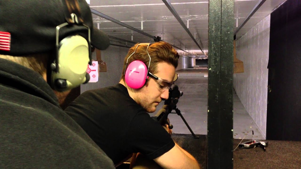 Mike Lerner shoots a 50 caliber sniper rifle in Denver